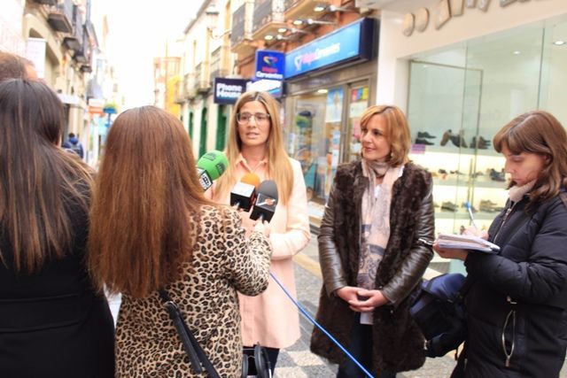 agudo visita comerciantes